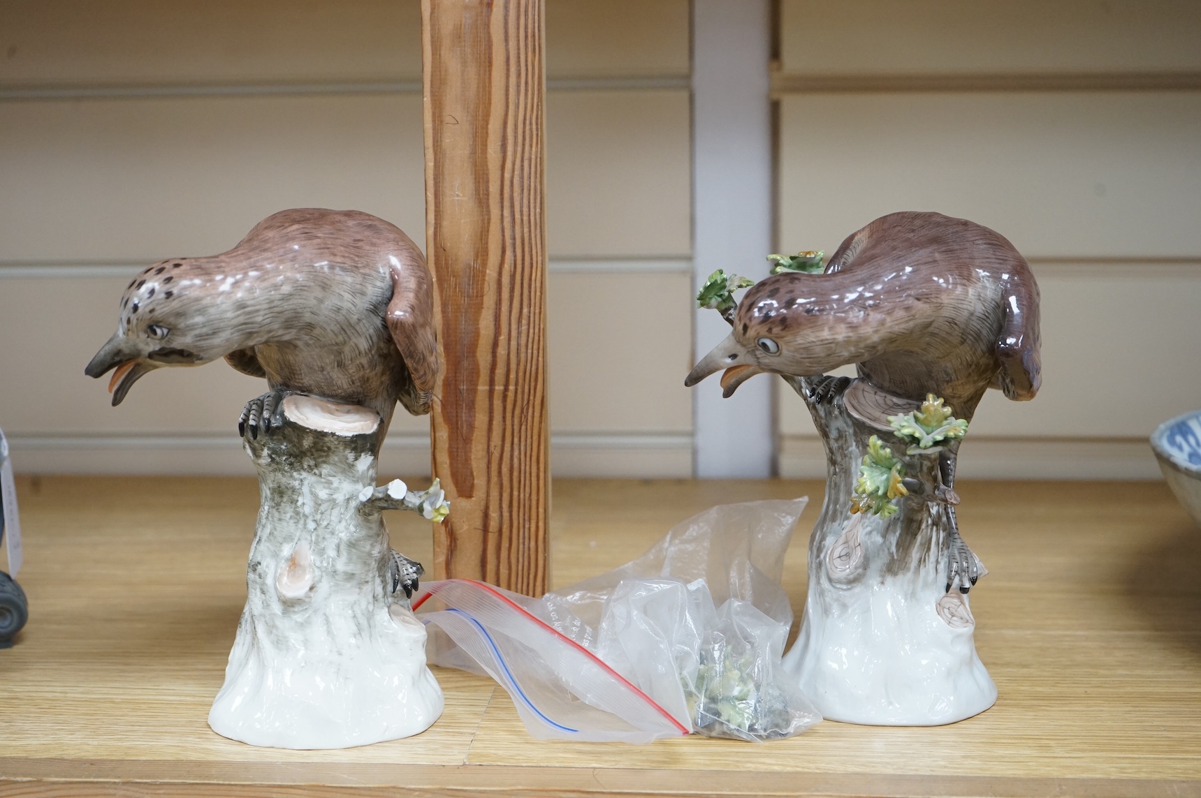 A pair of Meissen style porcelain models of Jays, 18cm